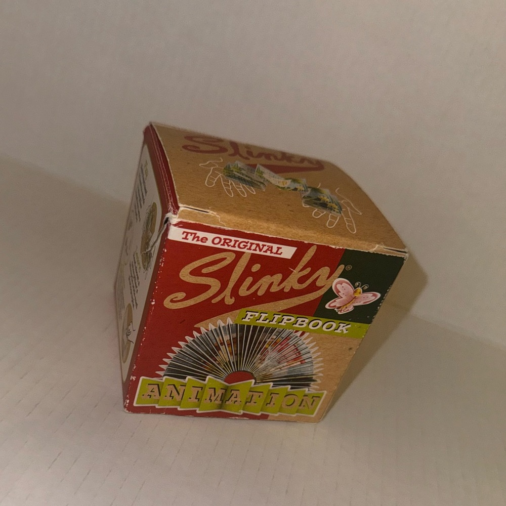 Vintage Slinky flip book in a box